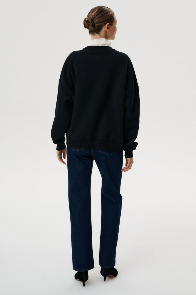 
                  
                    Czarna bawełniana bluza oversize Onera z spersonalizowany motywem MONOGRAM M
                  
                