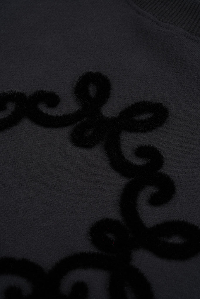 
                  
                    Czarna bawełniana bluza oversize Onera z spersonalizowany motywem MONOGRAM M
                  
                