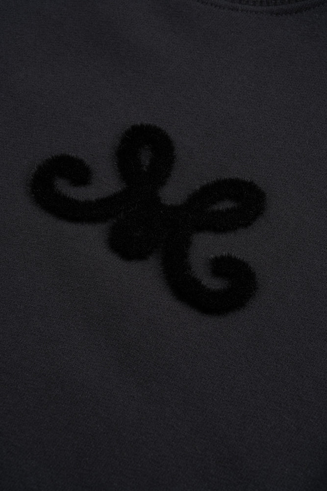 
                  
                    Czarna bawełniana bluza Velena z spersonalizowany motywem MONOGRAM M
                  
                