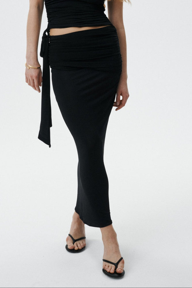 
                  
                    Black Mira skirt with draping
                  
                